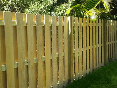 shadow box 6ft fence and black metal fence together|shadow box fence pricing.